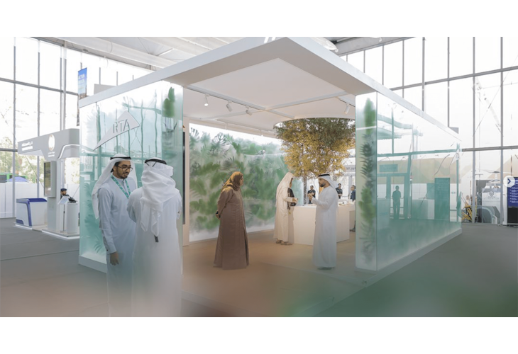 The RTA COP28 stand by Studio Königshausen in Dubai boasts an avant-garde design, featuring illuminated walls adorned with lush greenery, shaping an interactive, futuristic city model.